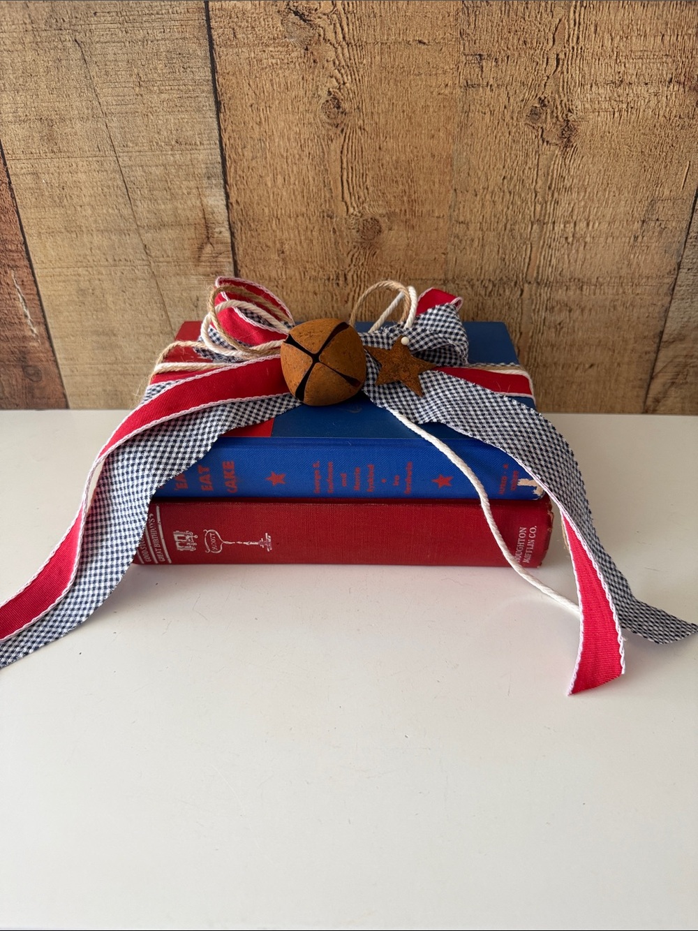 Americana Patriotic  Book Stack with Layered  Bow and Rusty Bell & Star Accent